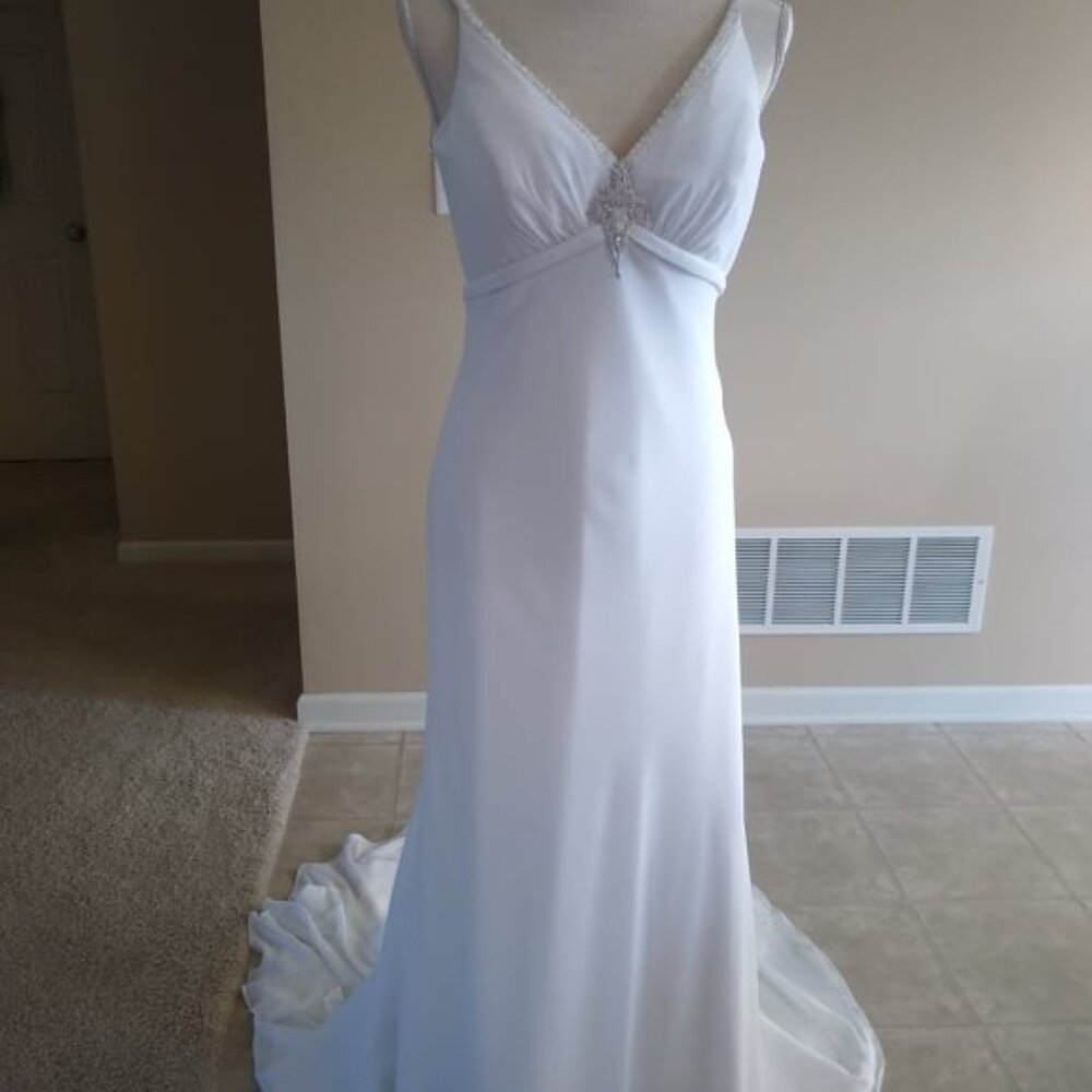 Wedding / Pageant Gown - Sweetheart neckline, beaded sheer illusions back.